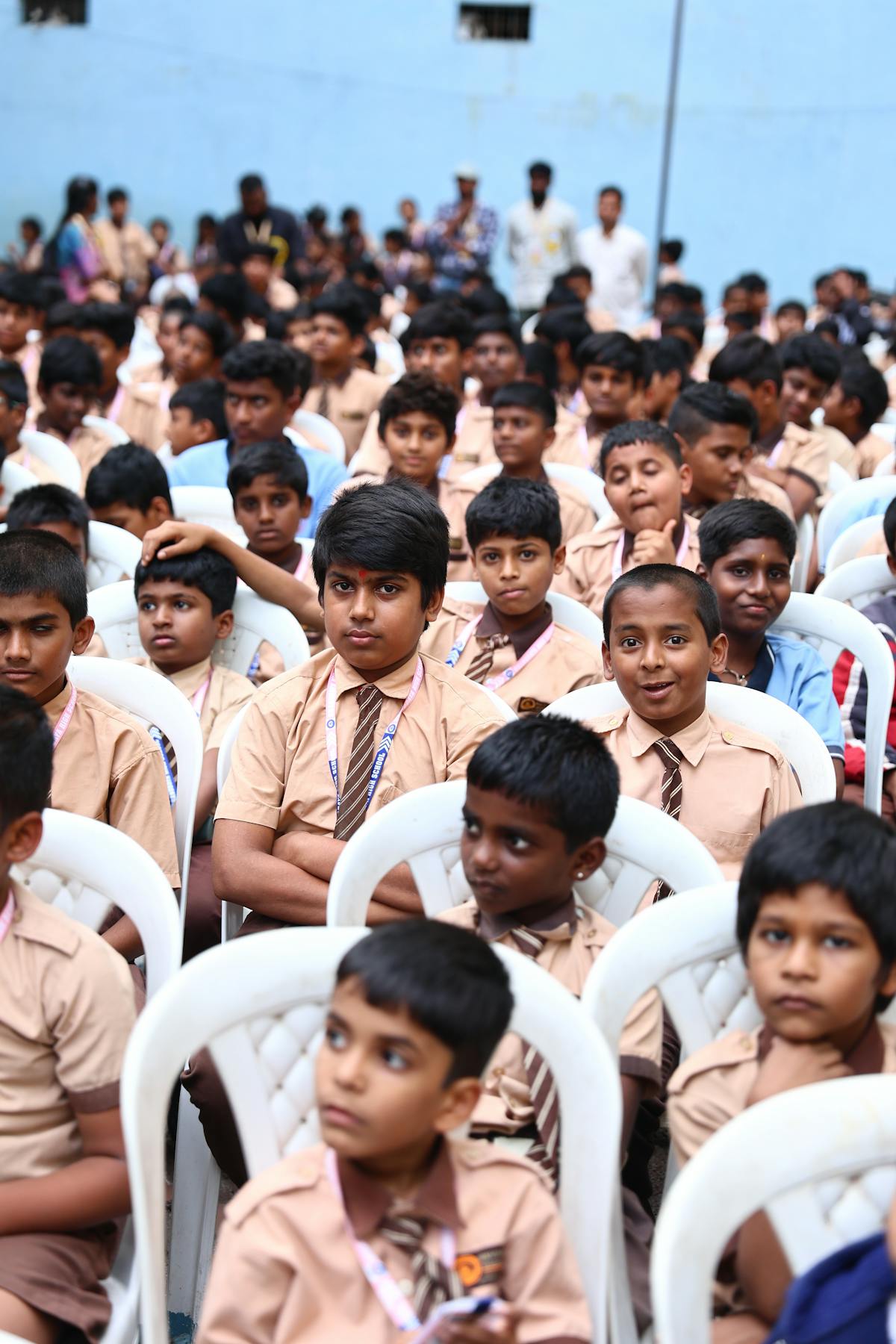 Indian school boys in uniform during a school assembly.